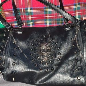 Studded skull shoulder bag